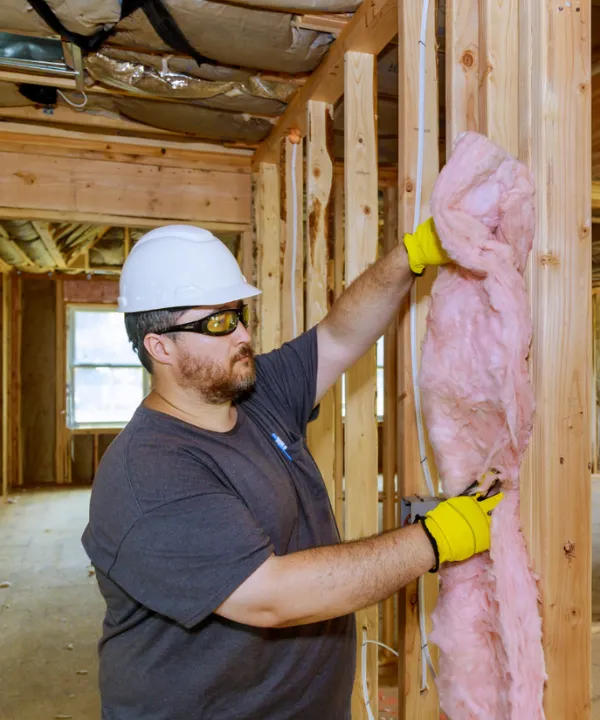 Insulation installation inside accessory dwelling unit walls during construction